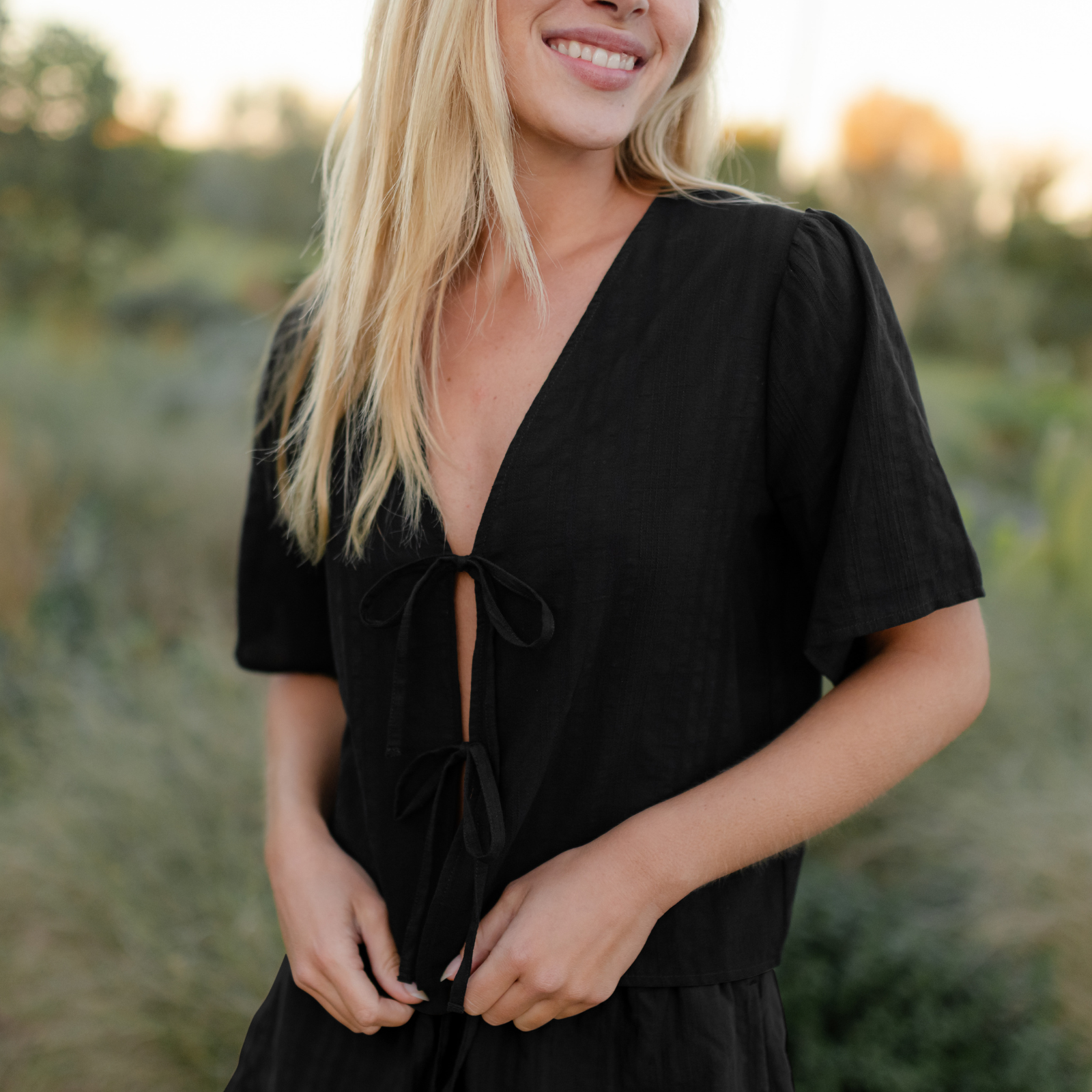 NORDLICHT Kari Jacquard Bluse Schwarz Kurzarm