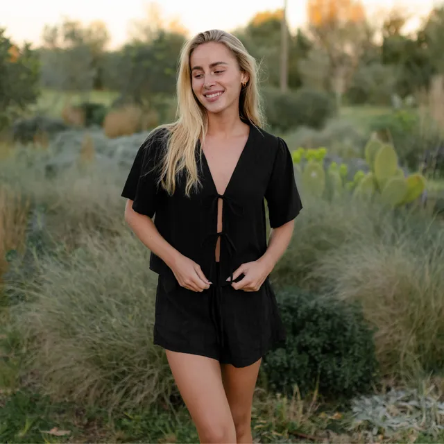 NORDLICHT Kari Jacquard Bluse Schwarz Kurzarm